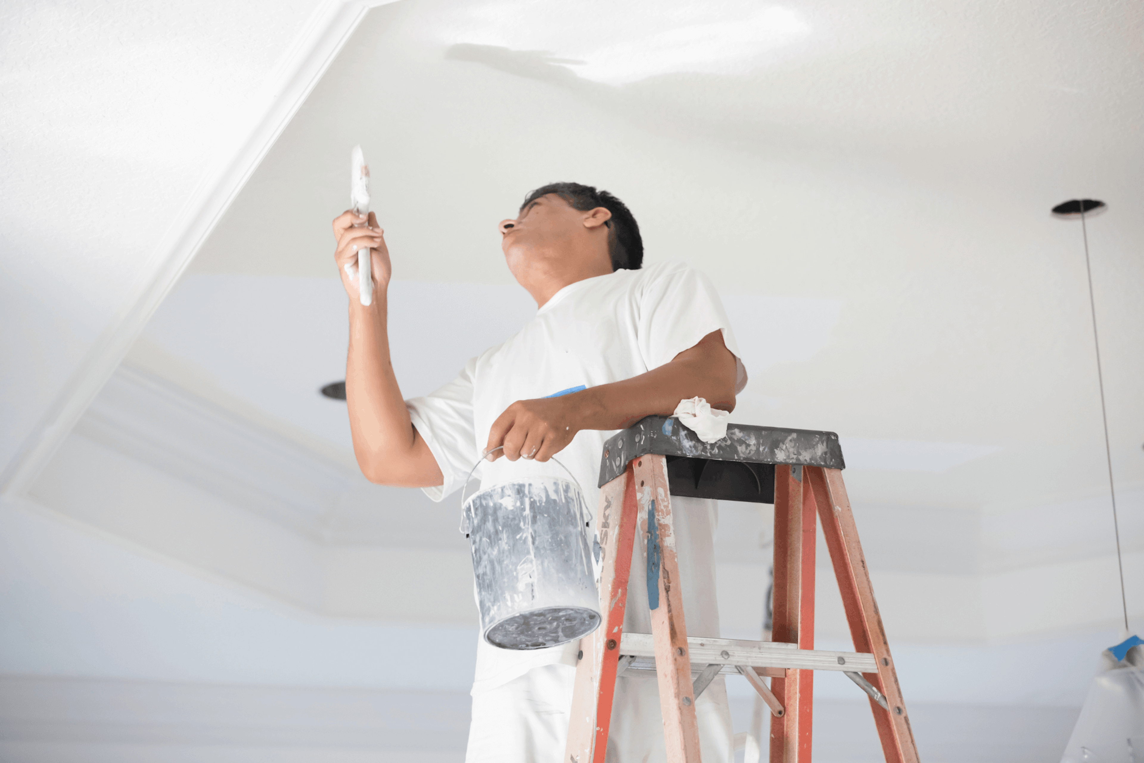 male contractor repairing a roof